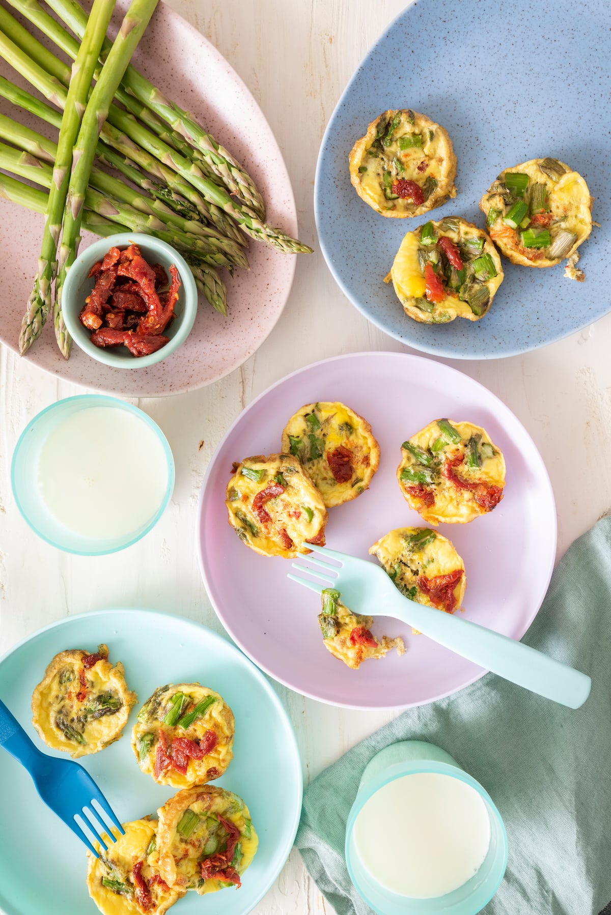 Baby frittatas on plates.
