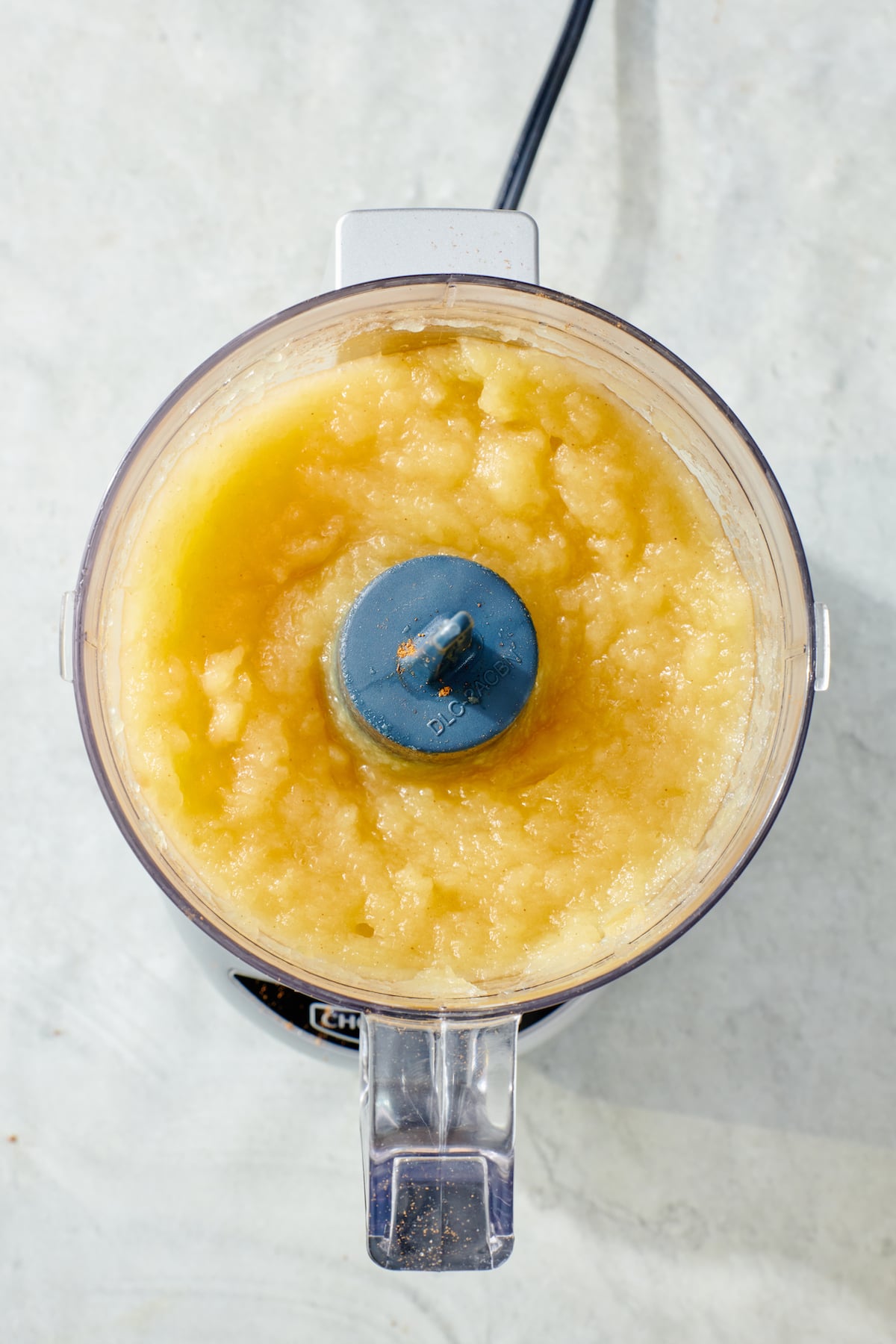 Puréed apples in food processor.