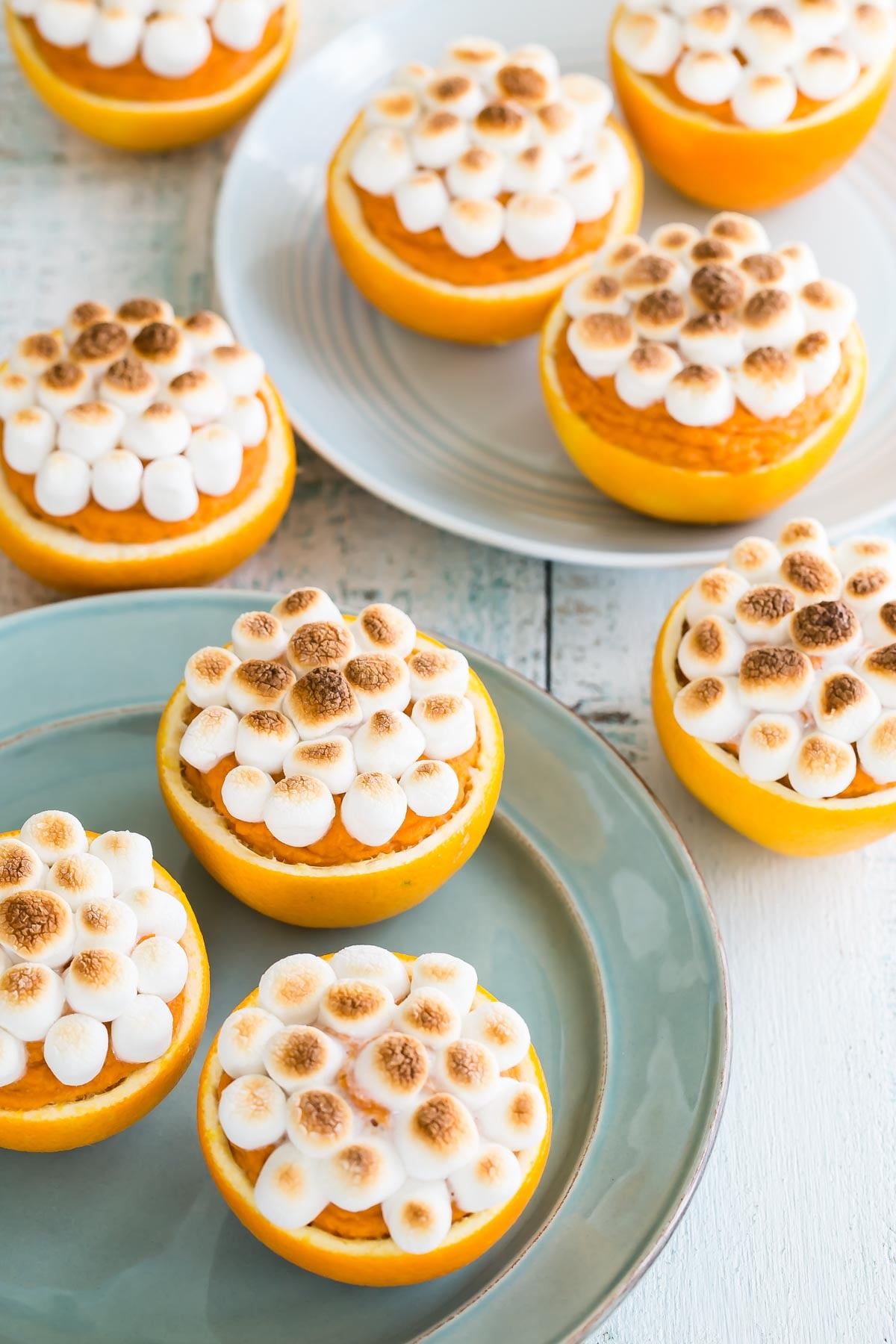 Sweet Potatoes In Orange Cups on serving plates. 