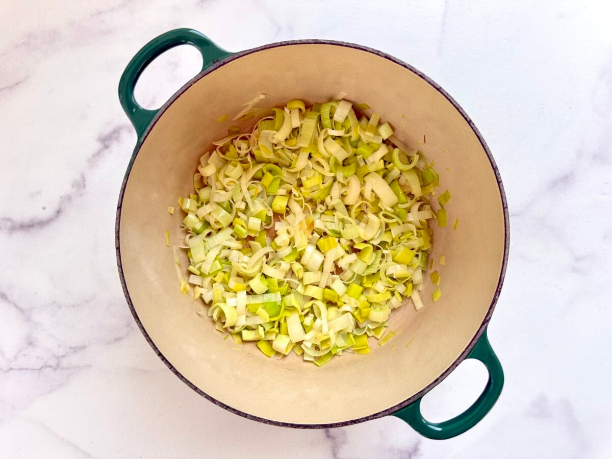 Sauteed leeks in a pot.