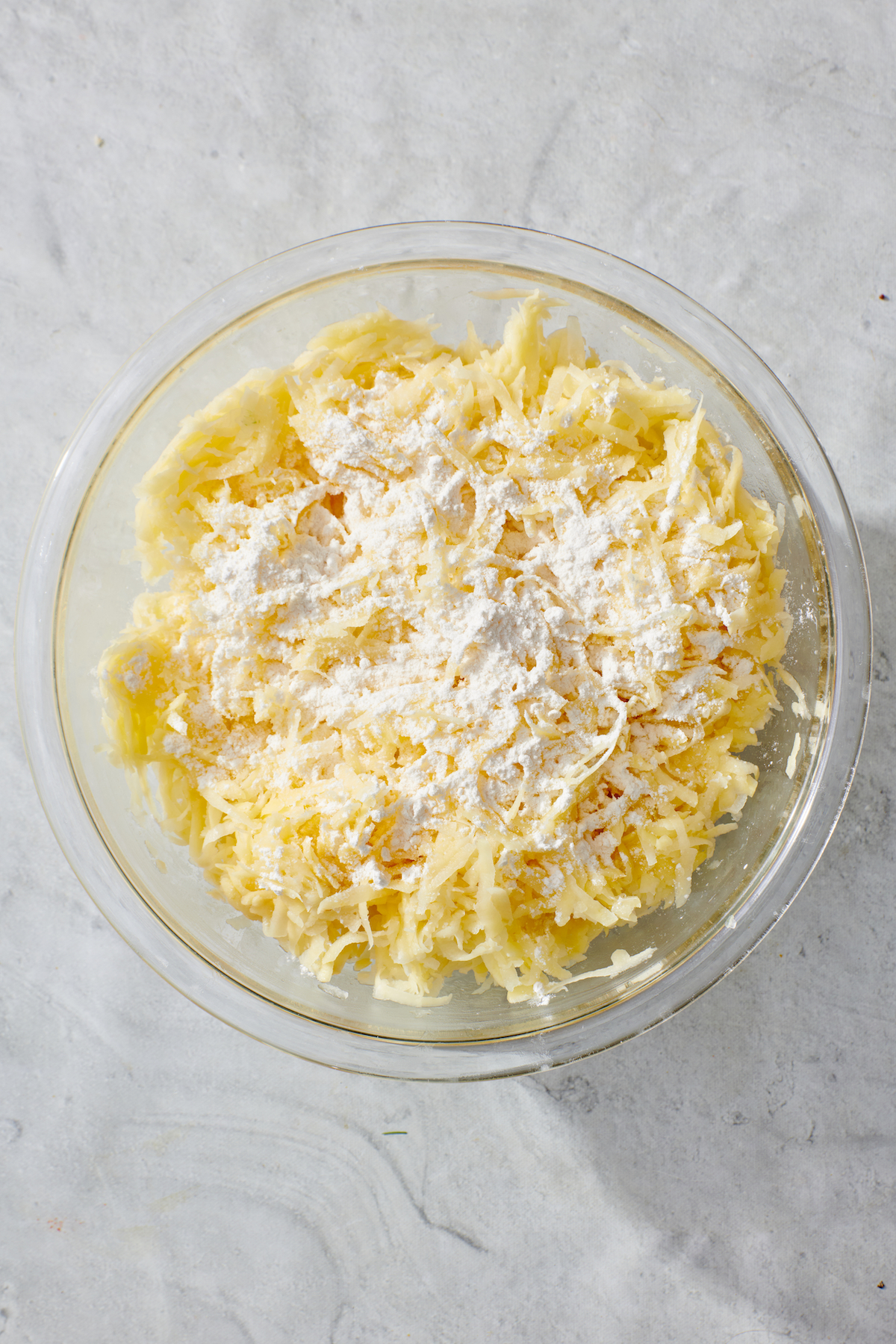 Potato Latke ingredients in a mixing bowl.