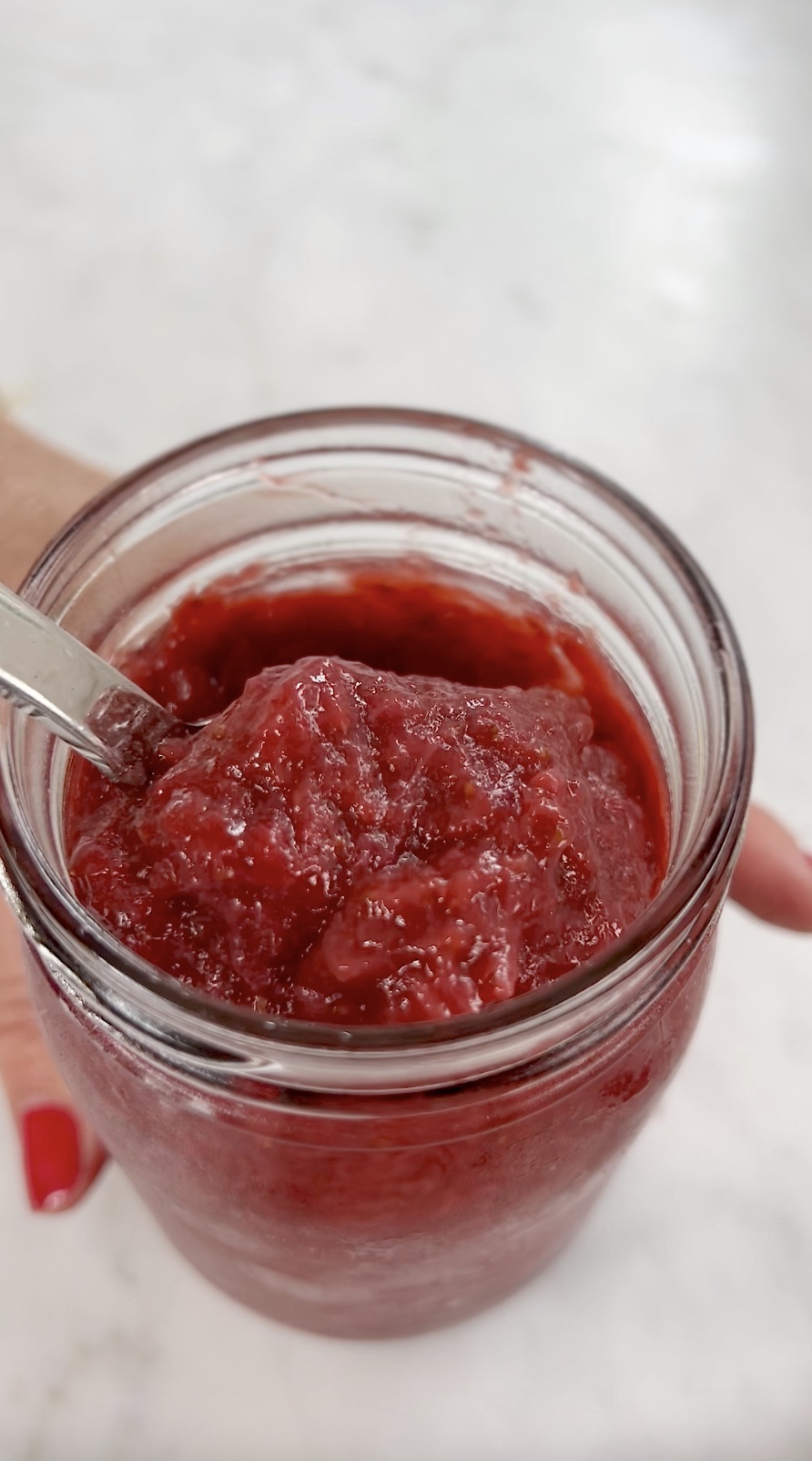 Strawberry Preserves in glass jar.