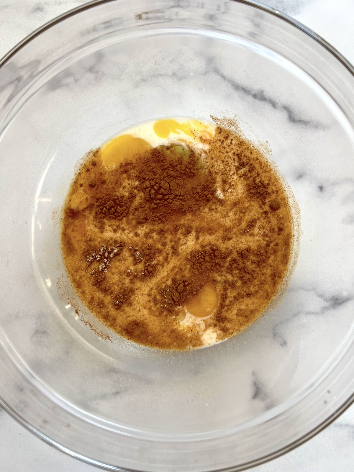 Eggs, milk, honey, cinnamon, vanilla and salt in mixing bowl.