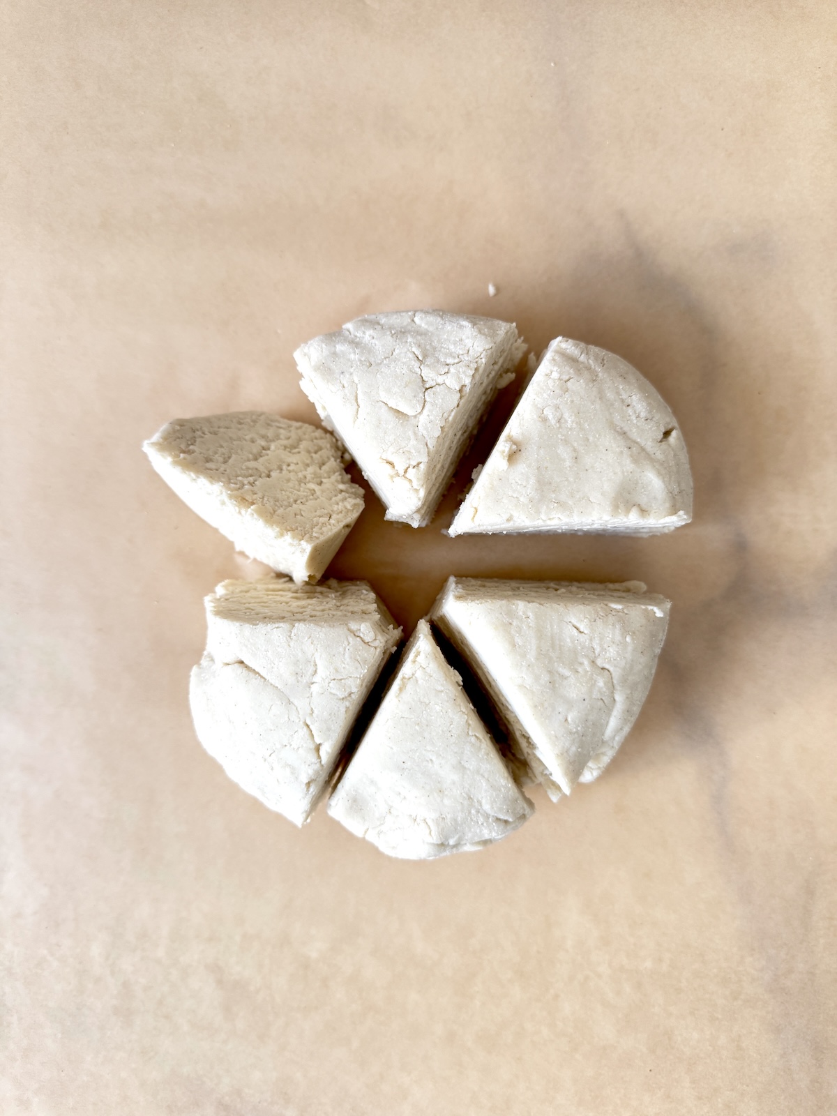 Pupusa dough divided into 6 even pieces.