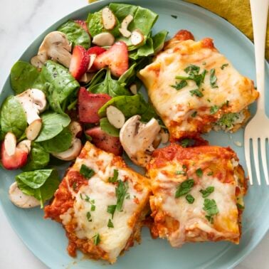 Lasagna rolls on a plate.