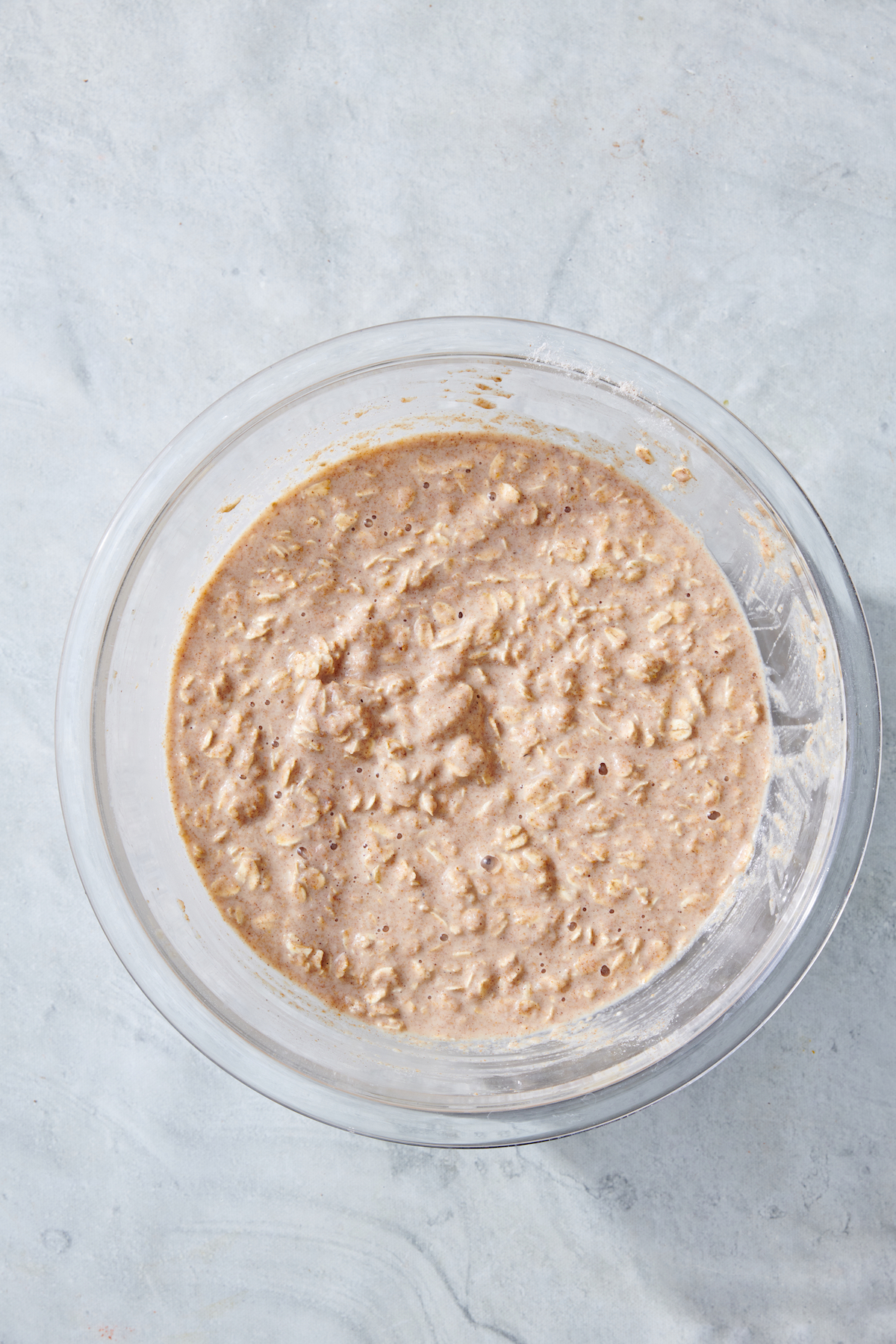 Combined dry and wet ingredients to make oatmeal bar mixture.