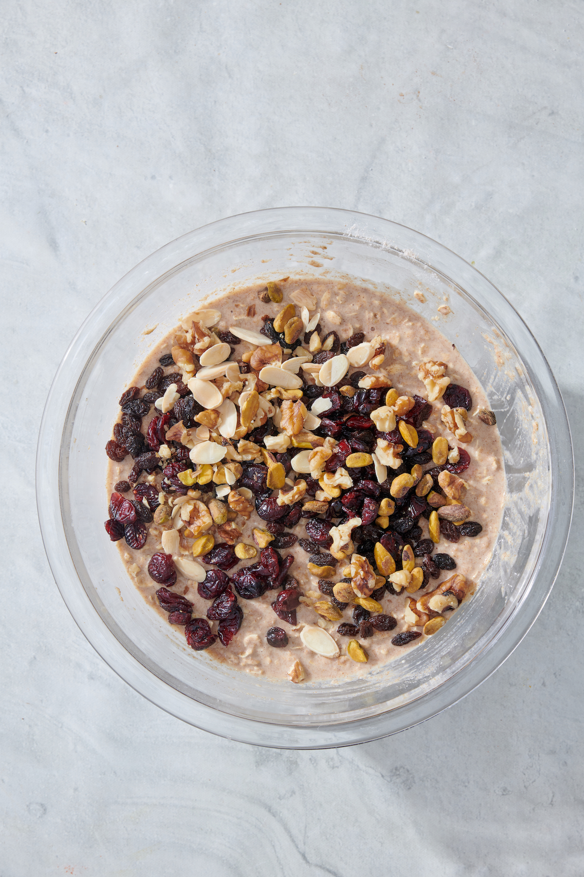Nuts and dried fruit added to oatmeal mixture.