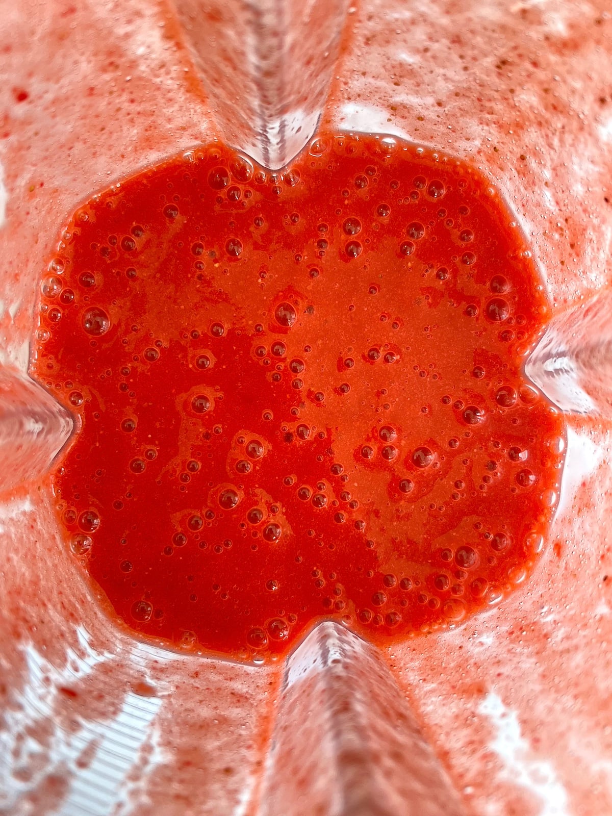 Strawberry puree in a blender.