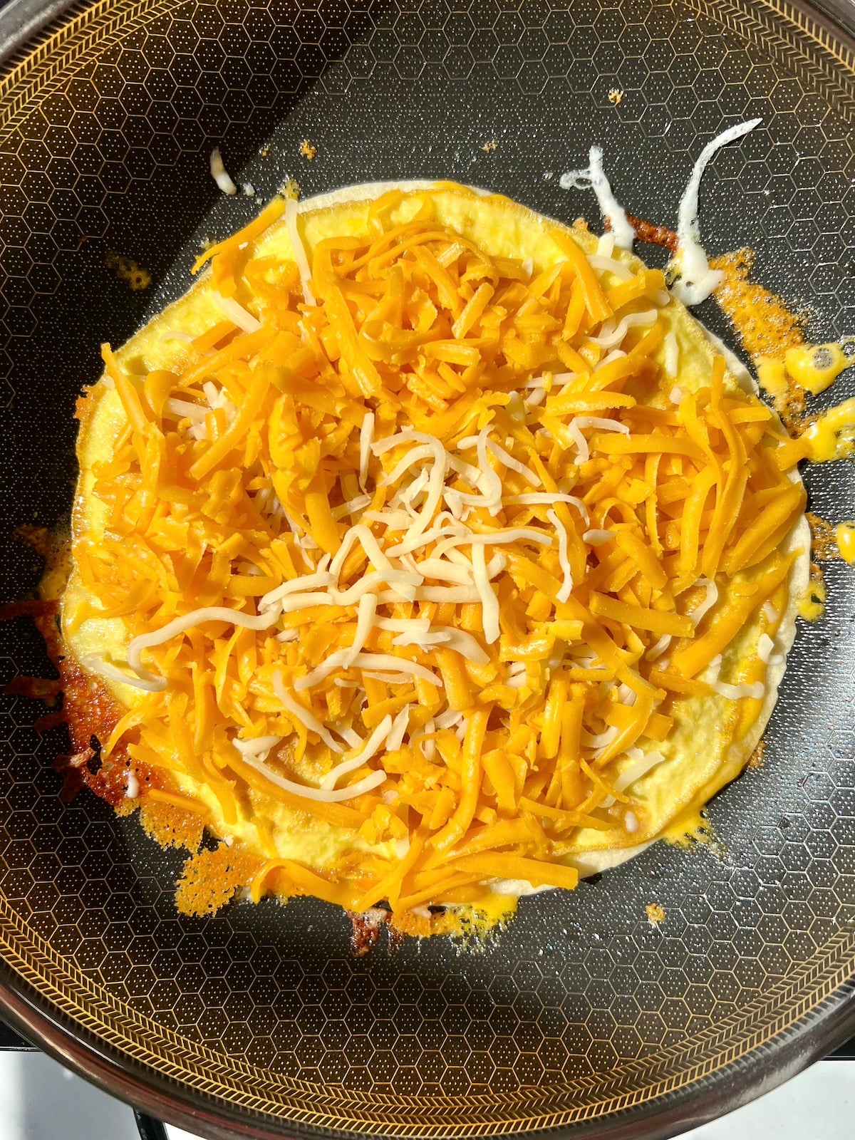 Open face quesadilla on skillet.