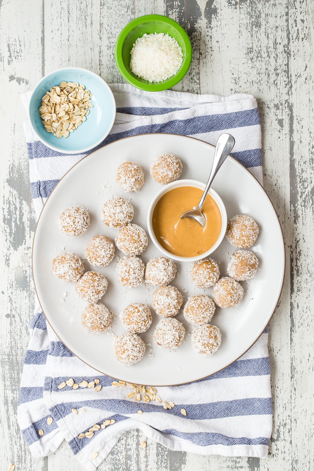 Coconut Peanut Butter Oatmeal Balls on a plate.