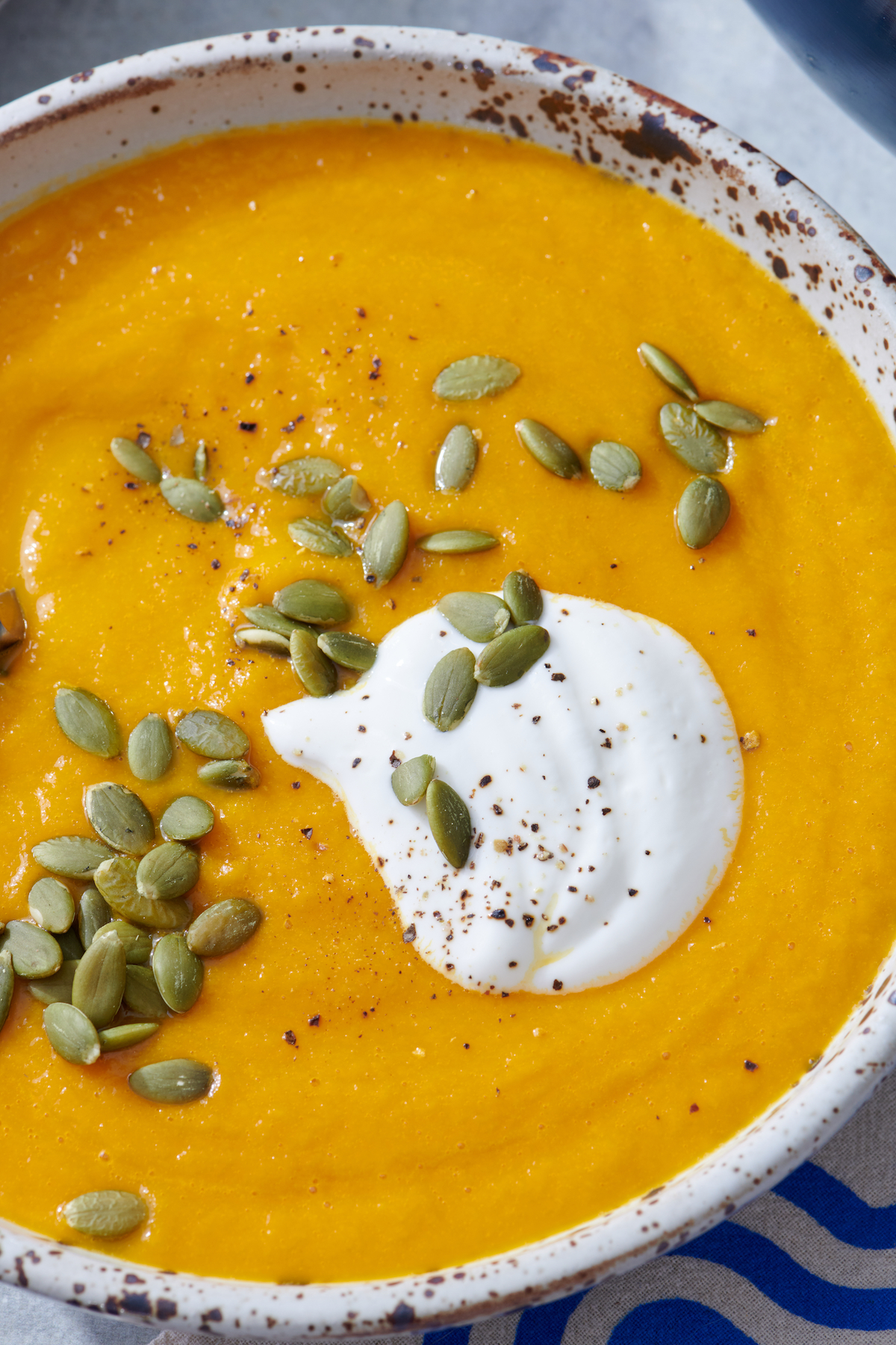 Carrot ginger soup in bowl.