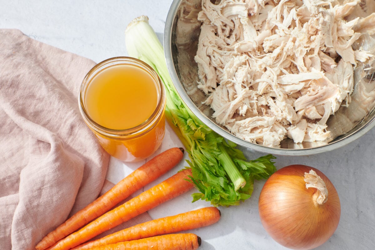 Chicken stock, shredded cooked chicken and other ingredients.