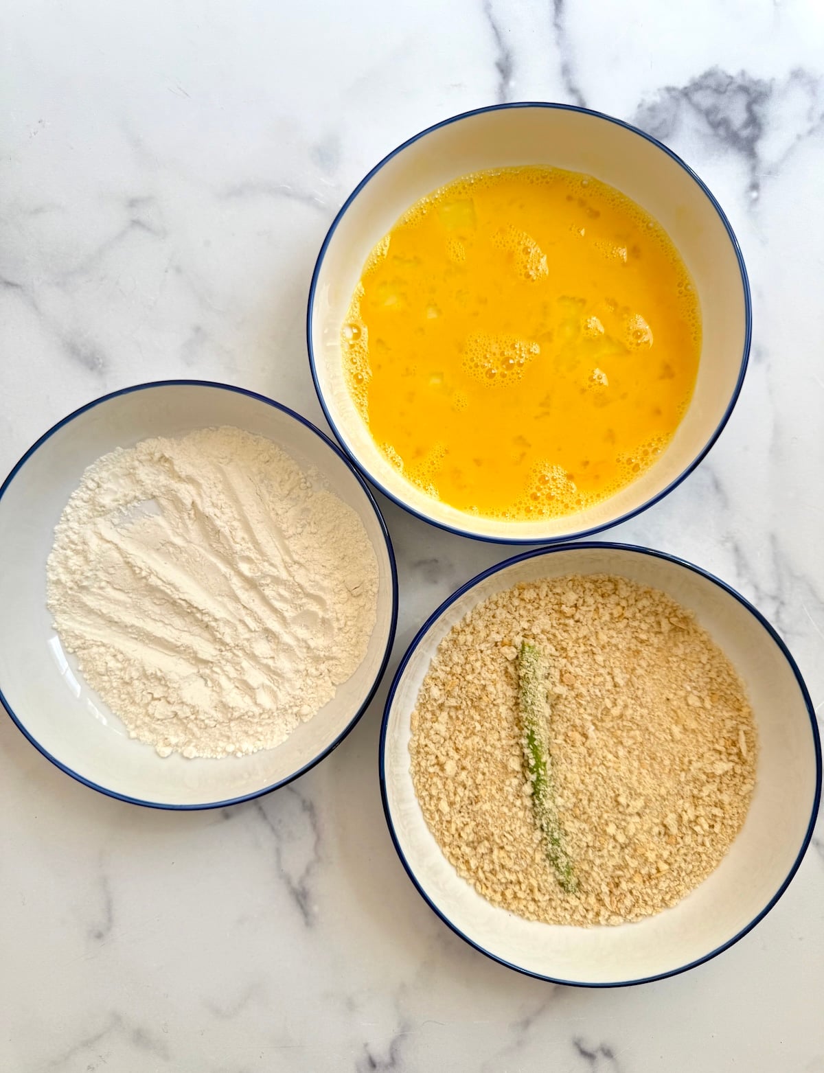 Breading station for green bean fries.
