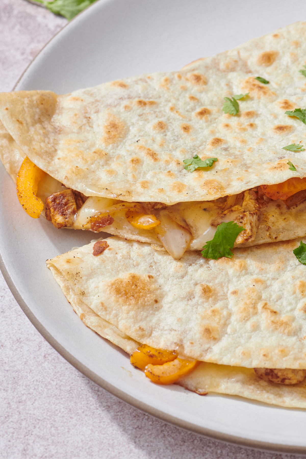 Chicken fajita quesadillas on a plate.