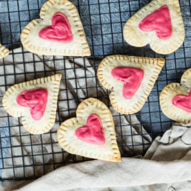Raspberry cream cheese filled heart-shaped tarts.