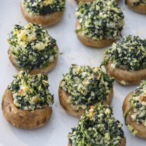 Stuffed mushroom on serving platter.