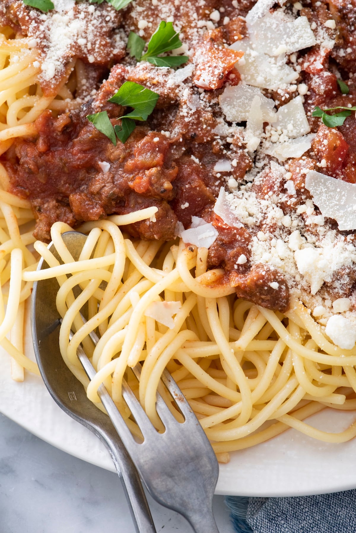 Crock pot pasta sauce over spaghetti noodles.