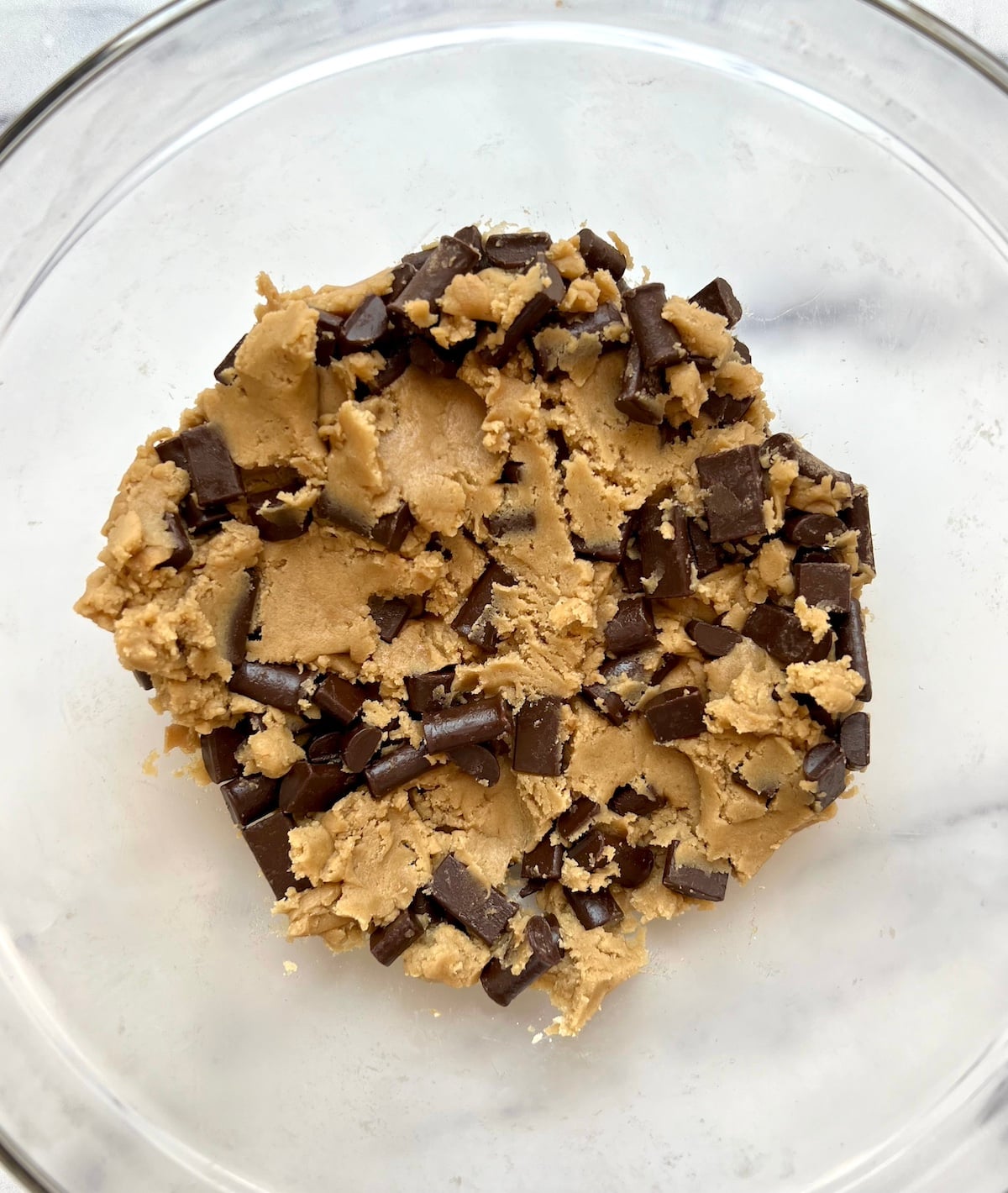 Vegan chocolate chip cookie dough in mixing bowl.