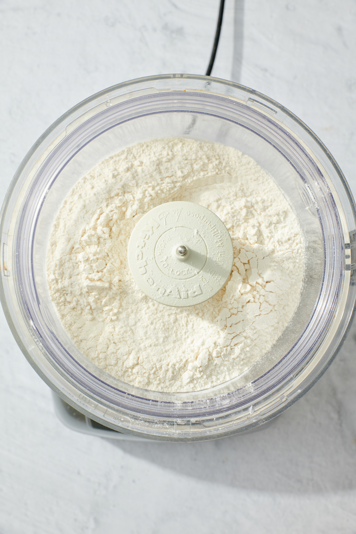 Flour, salt and sugar in food processor
