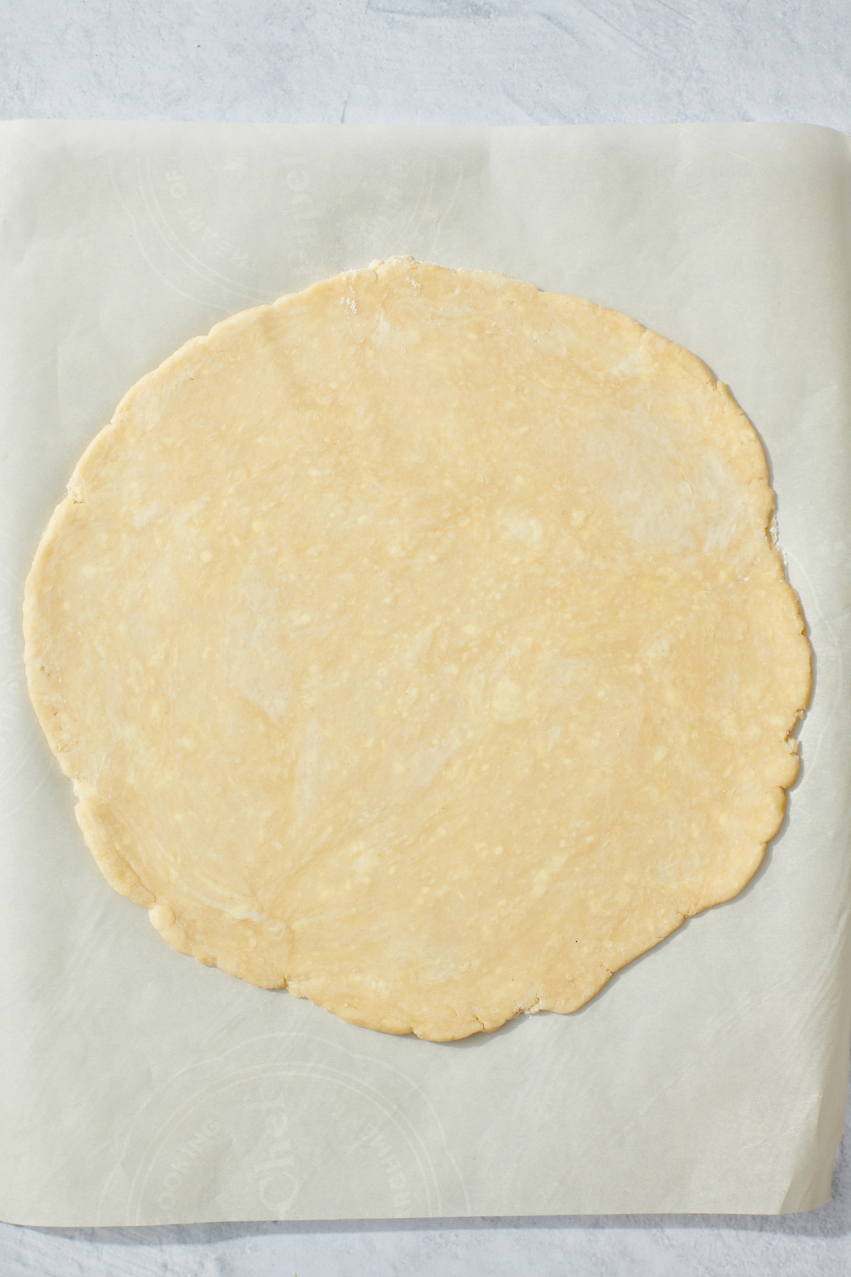 Rolled out pie crust.