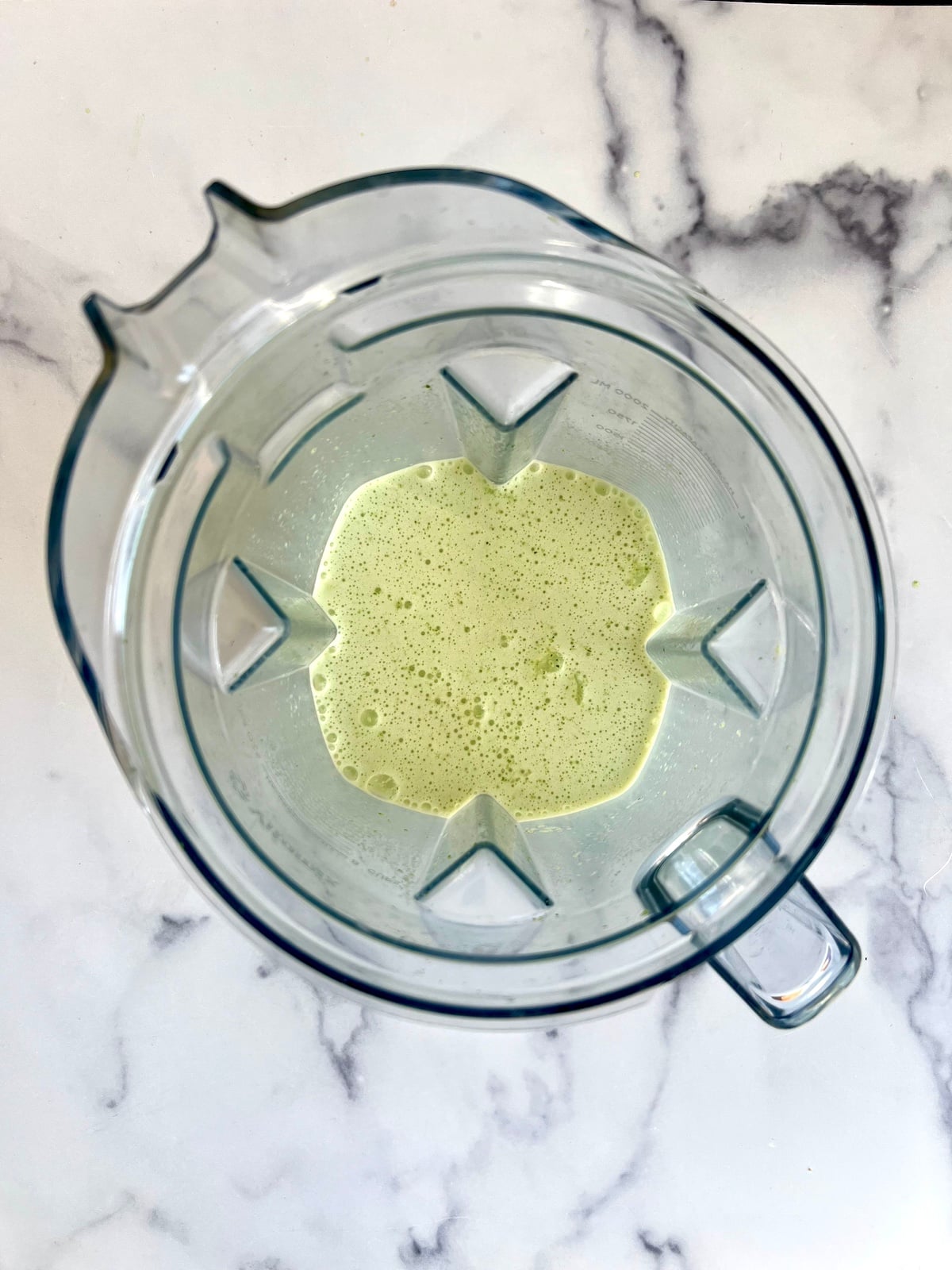 Milk and spinach blended together.