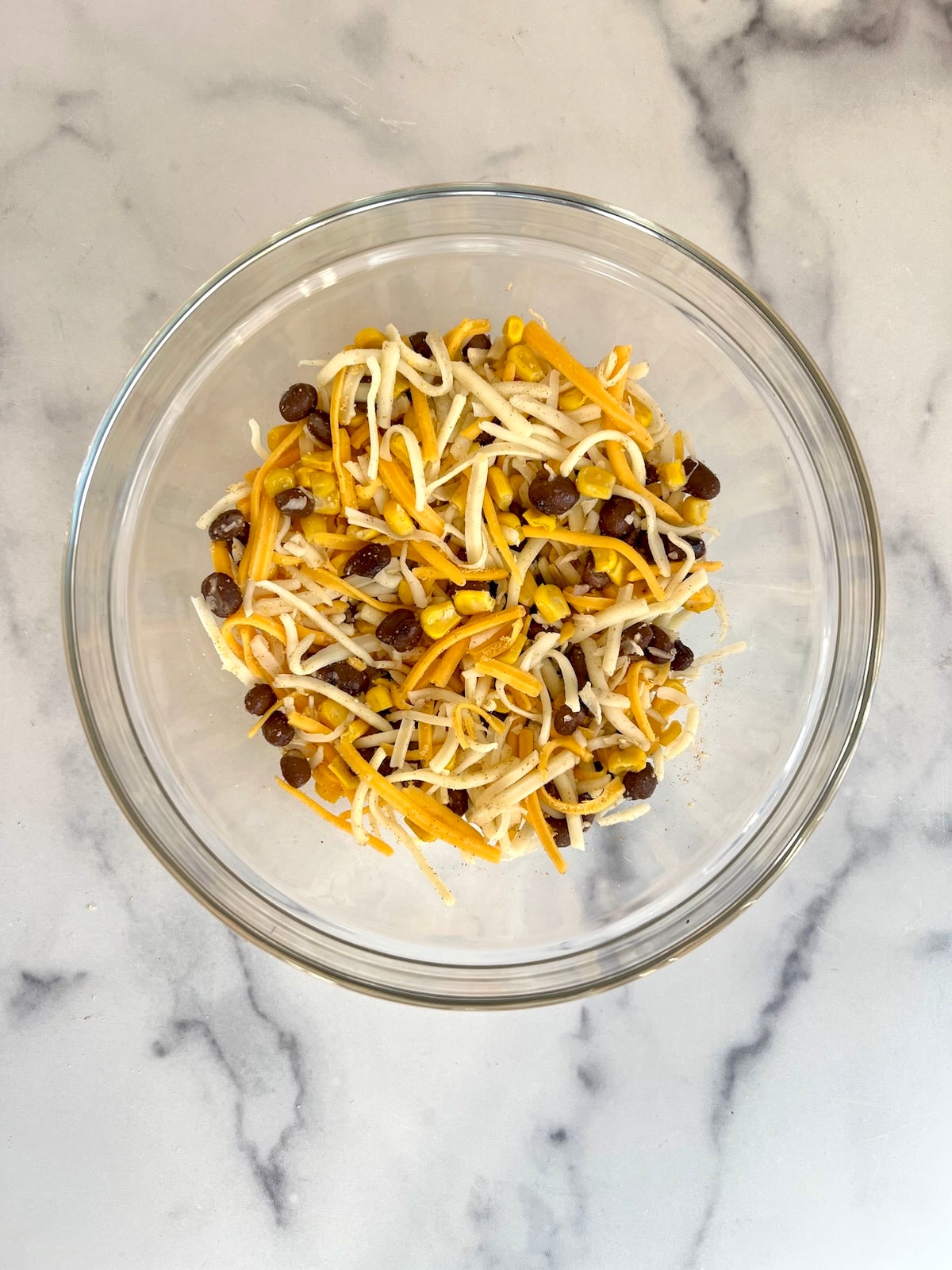 Vegetarian taquitos filling in a mixing bowl.