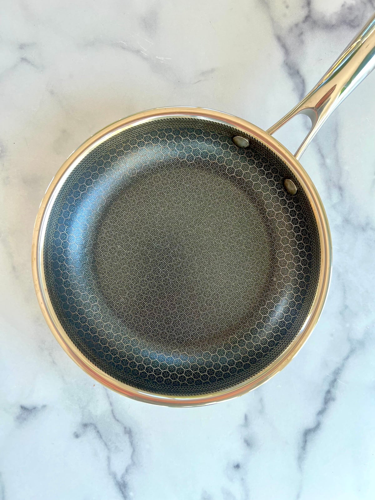 Heating a pan over medium heat.