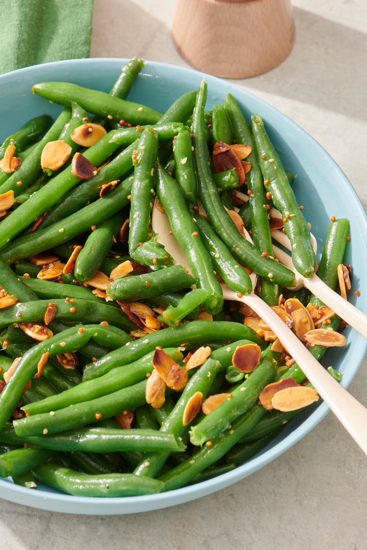 Green Bean Salad with Mustard Vinaigrette in blue serving bowl.