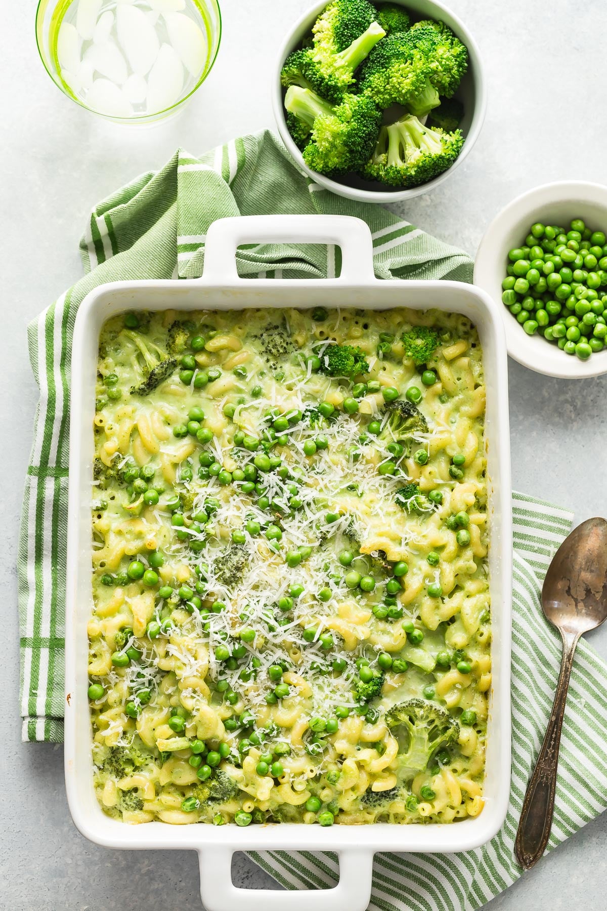 Green Mac and cheese in a baking dish.