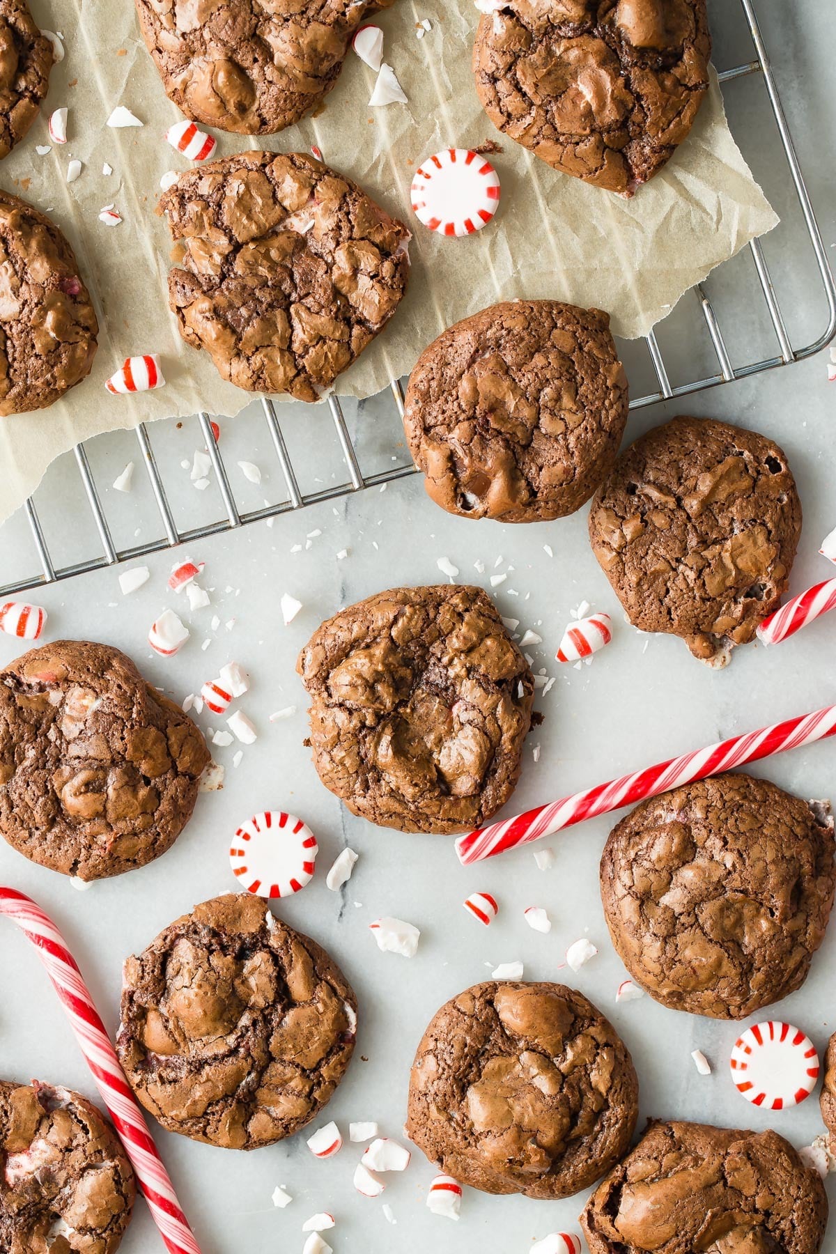 Peppermint Brookies on cooling rack with pieces of peppermint surrounding.
