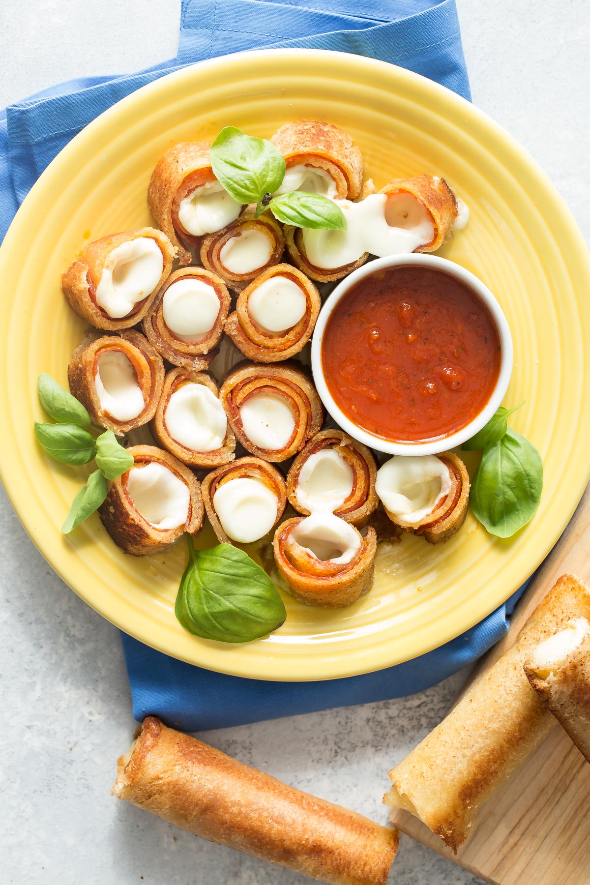 Grilled Pizza Roll Ups on a plate.