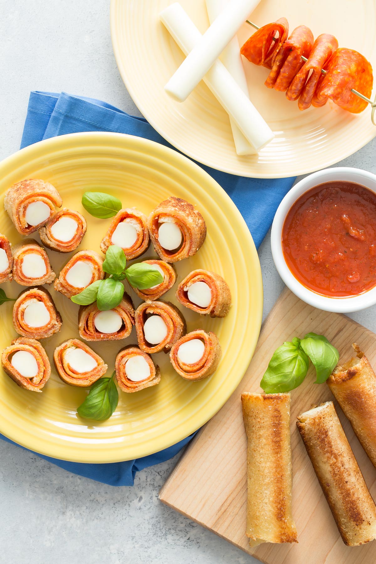 Pizza Roll Ups on a plate.