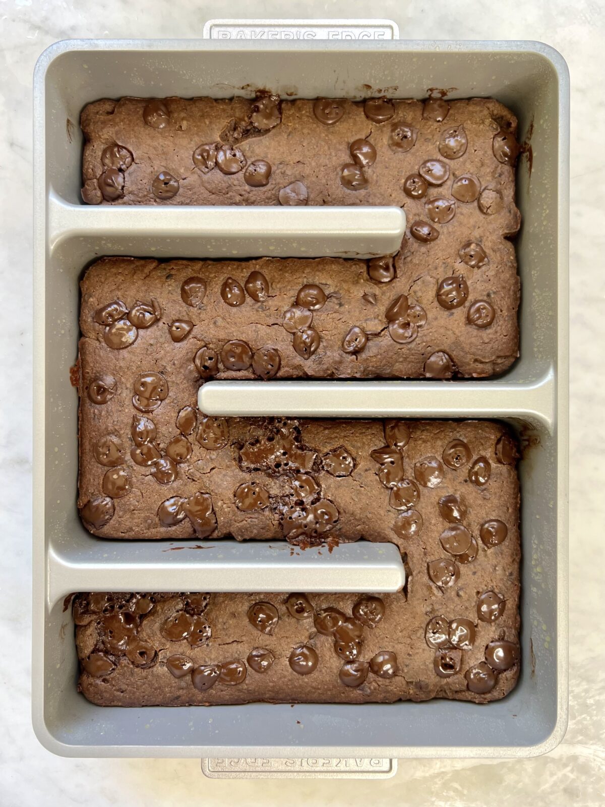 gluten free black bean brownies in perfect brownie pan