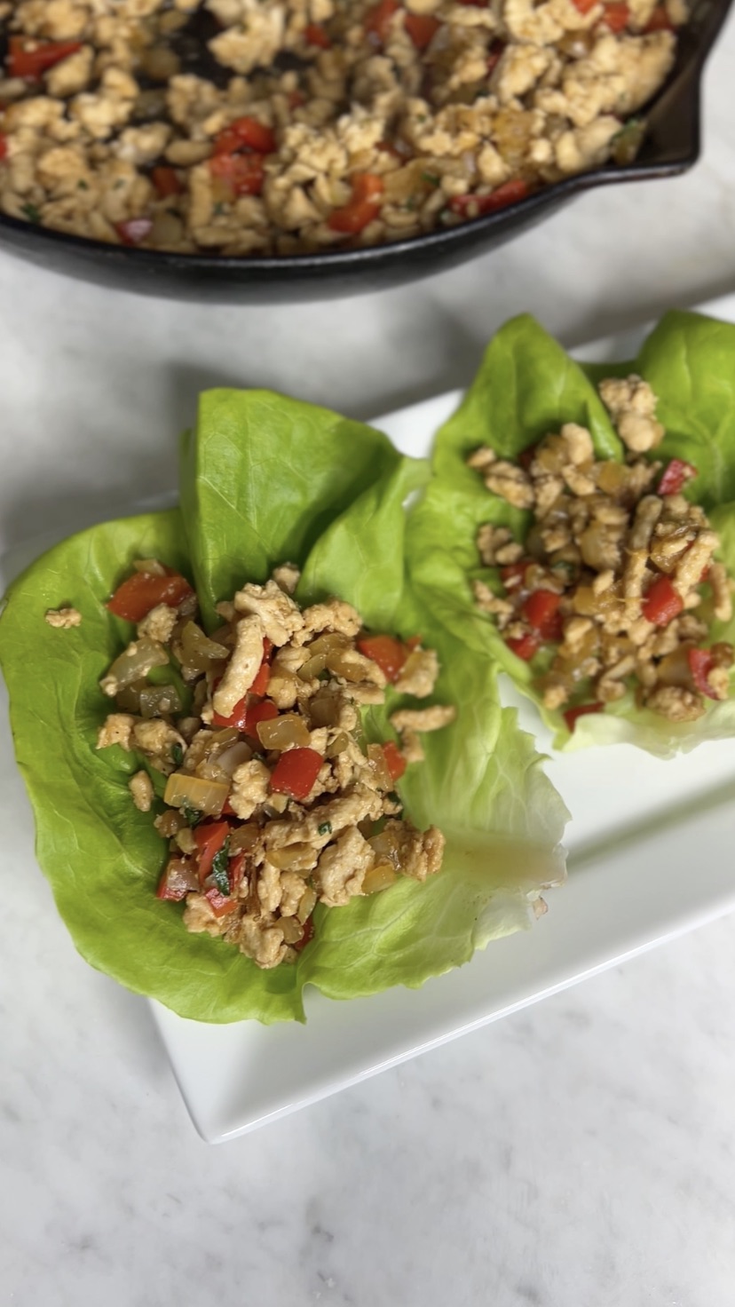 Ground chicken lettuce wraps on a platter.
