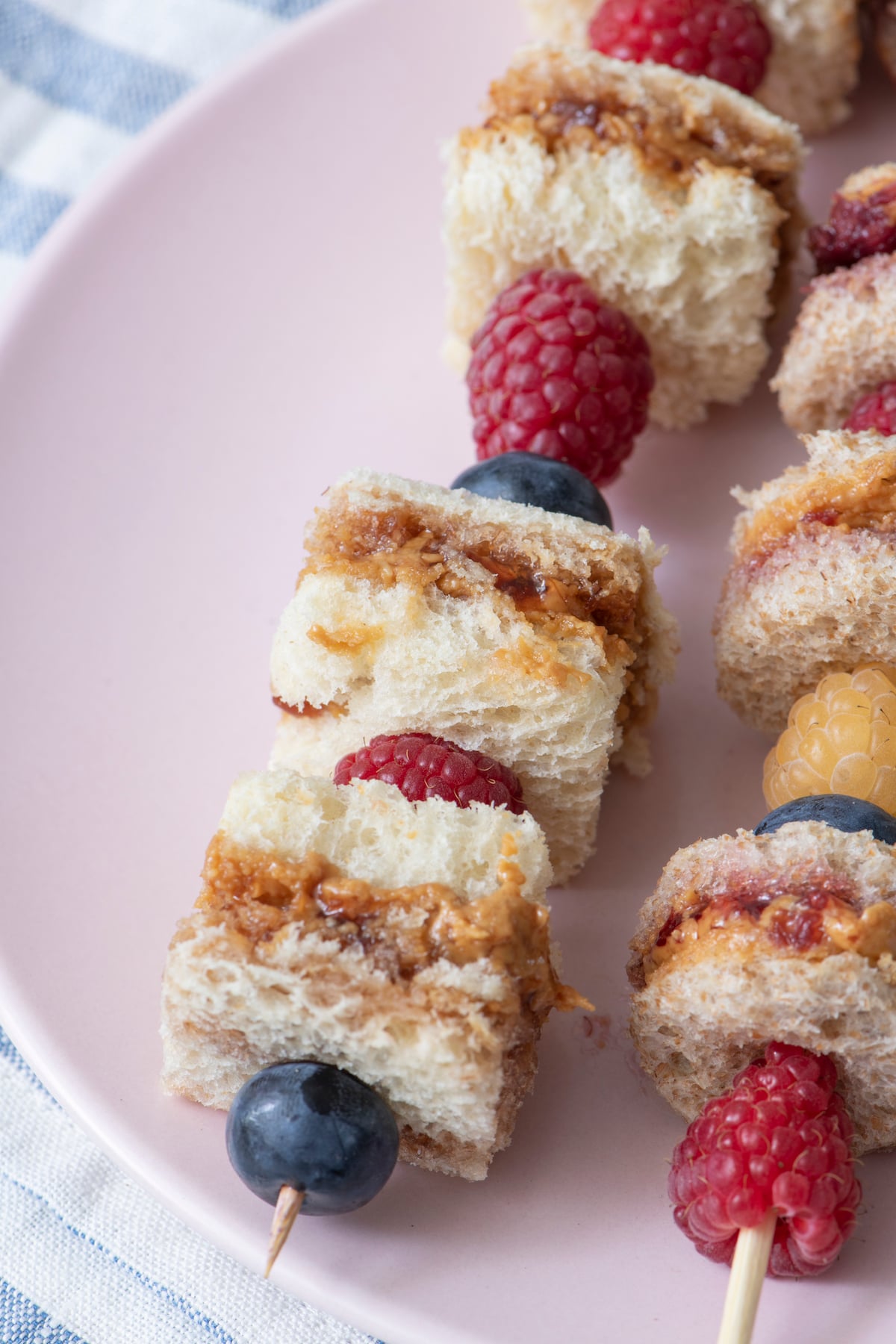 close up of peanut butter and jelly skewers