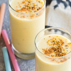Mango spied smoothies topped with bee pollen.
