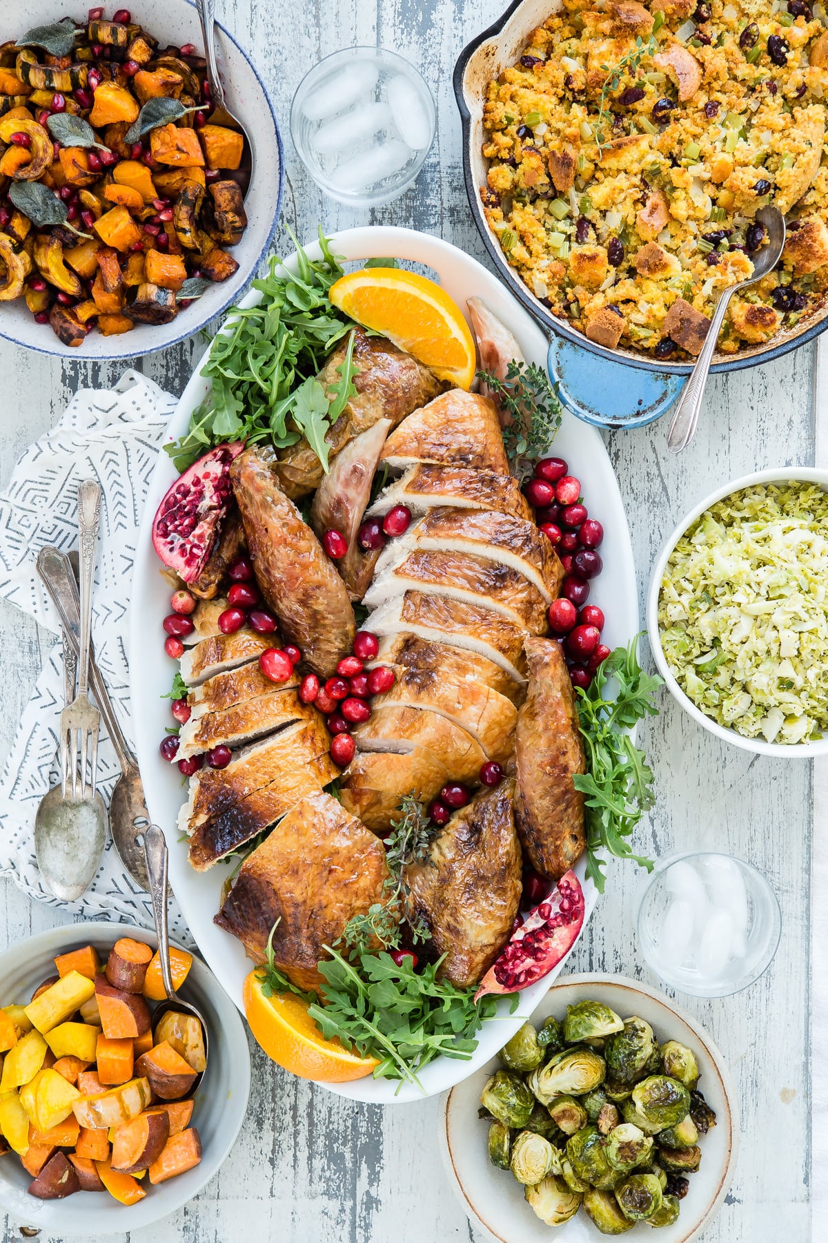 Carved turkey with Thanksgiving sides.