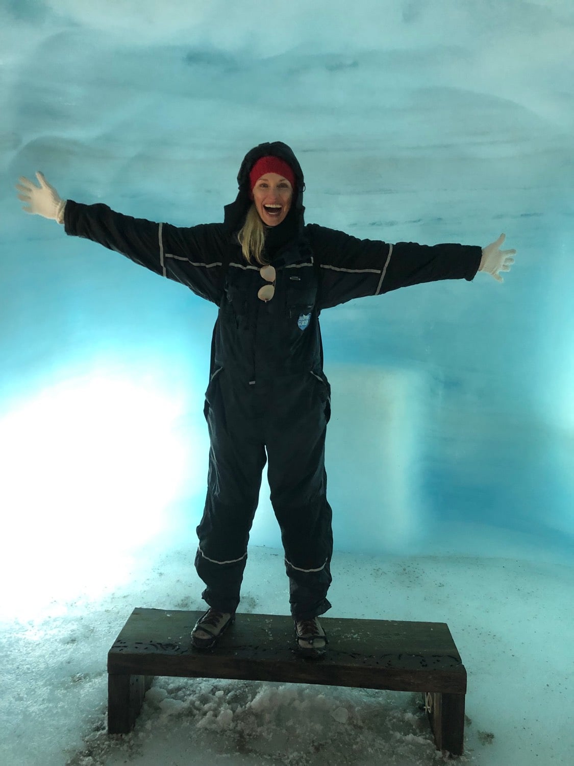 Woman inside an ice cave in Iceland.