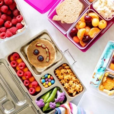 Various bento boxes with school lunches.