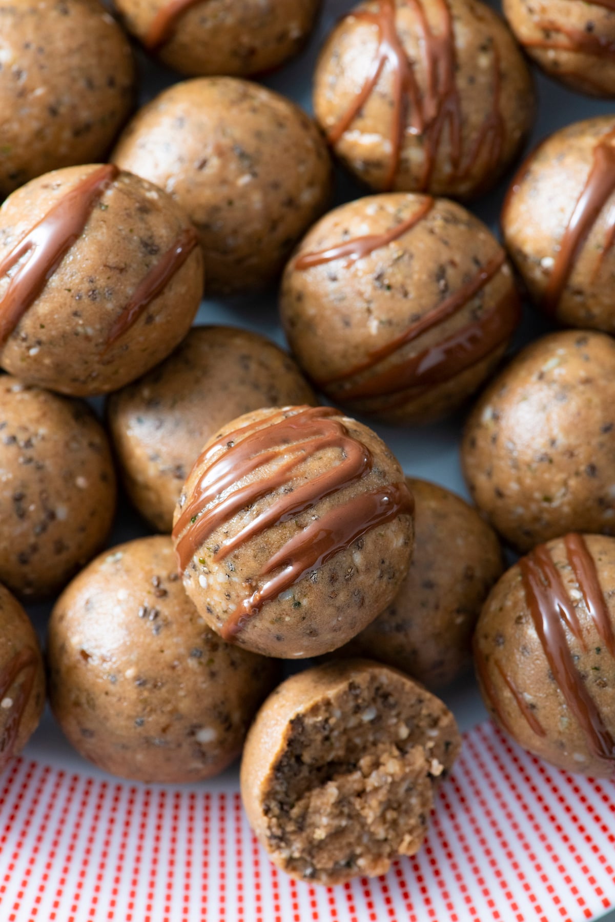 Protein balls with chocolate drizzle.