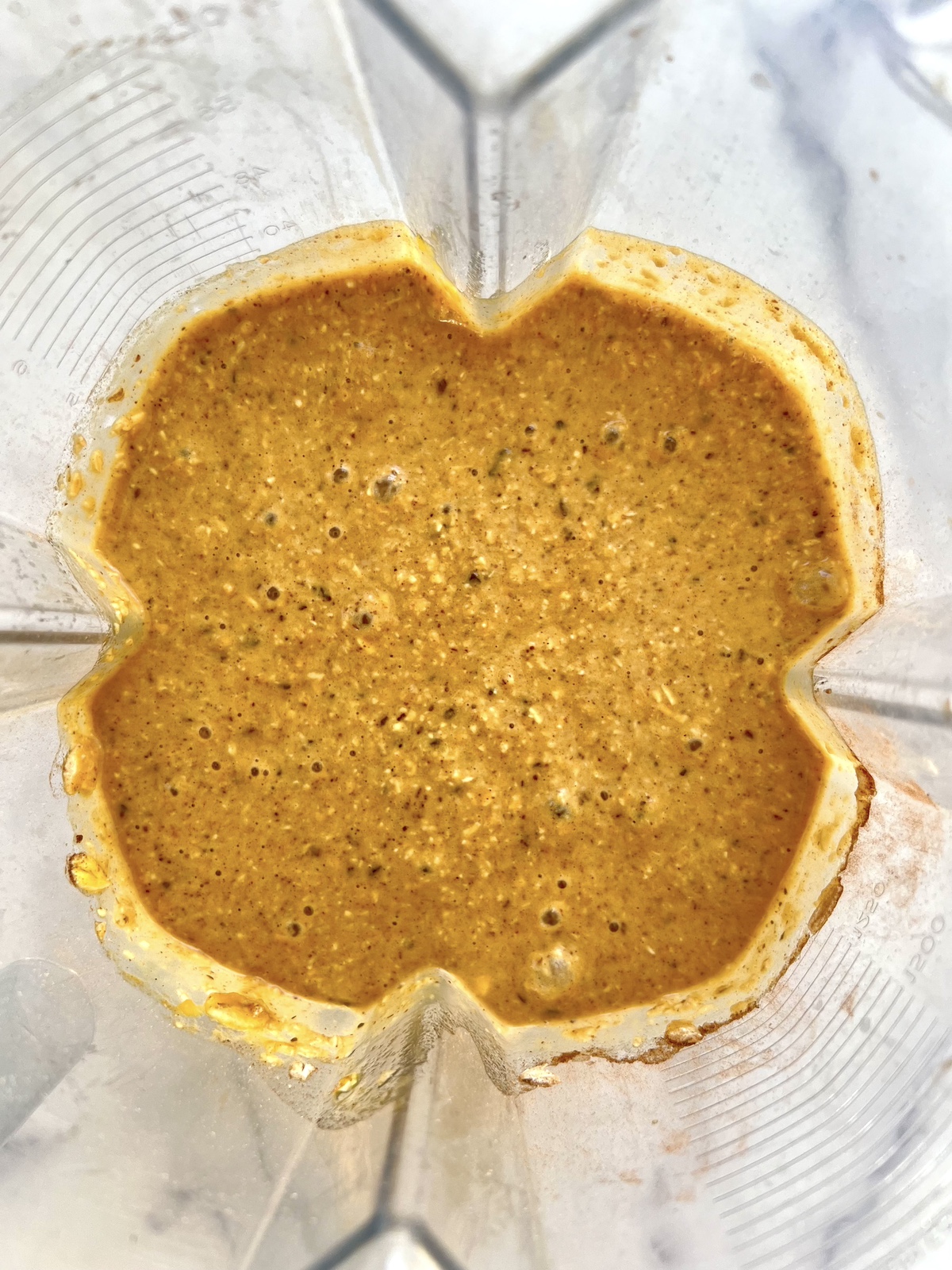 Flourless pumpkin chocolate muffins batter in a blender.