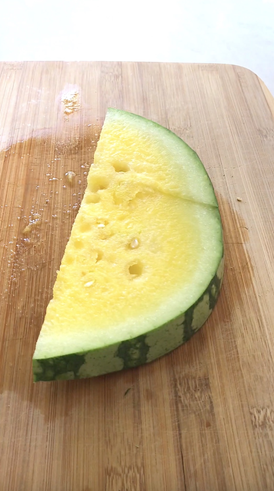 Half moon shaped slice of watermelon.