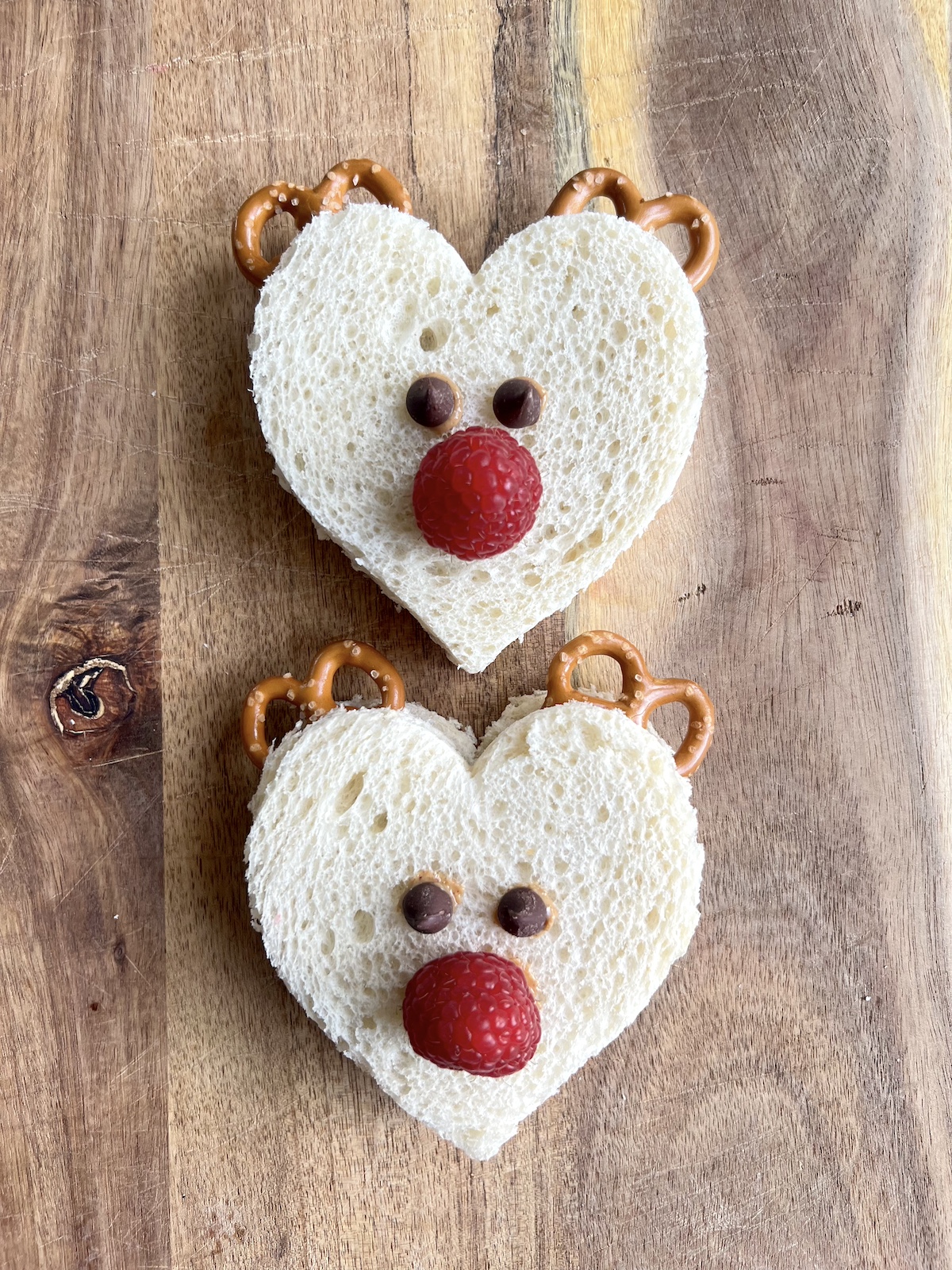 Reindeer sandwiches on cutting board.