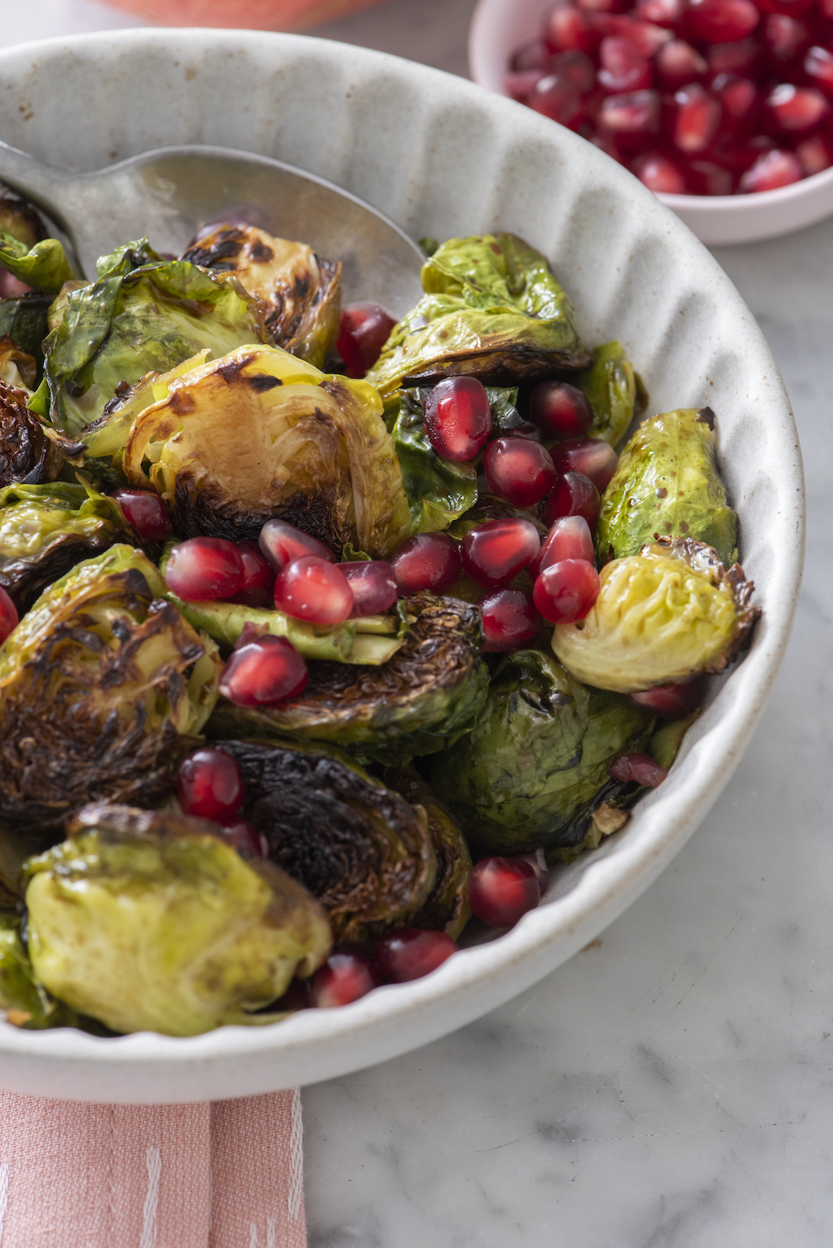 A bowl of cast iron roasted Brussels sprouts.