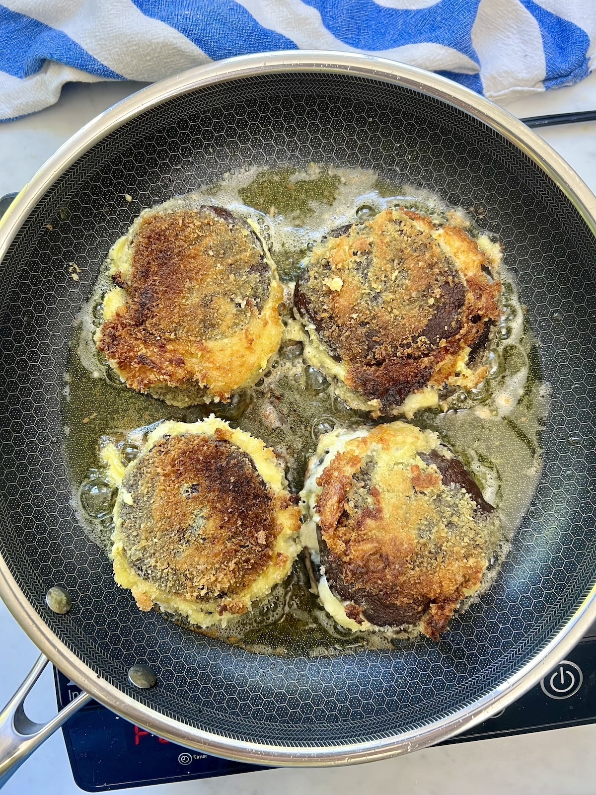 Shroom Burgers in saute pan.