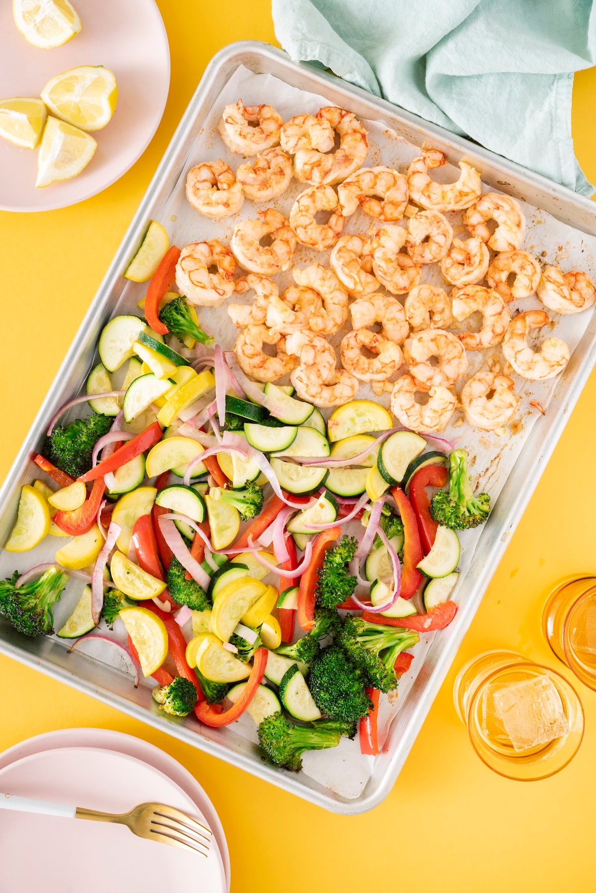 Sheet pan with shrimp and roasted vegetables.