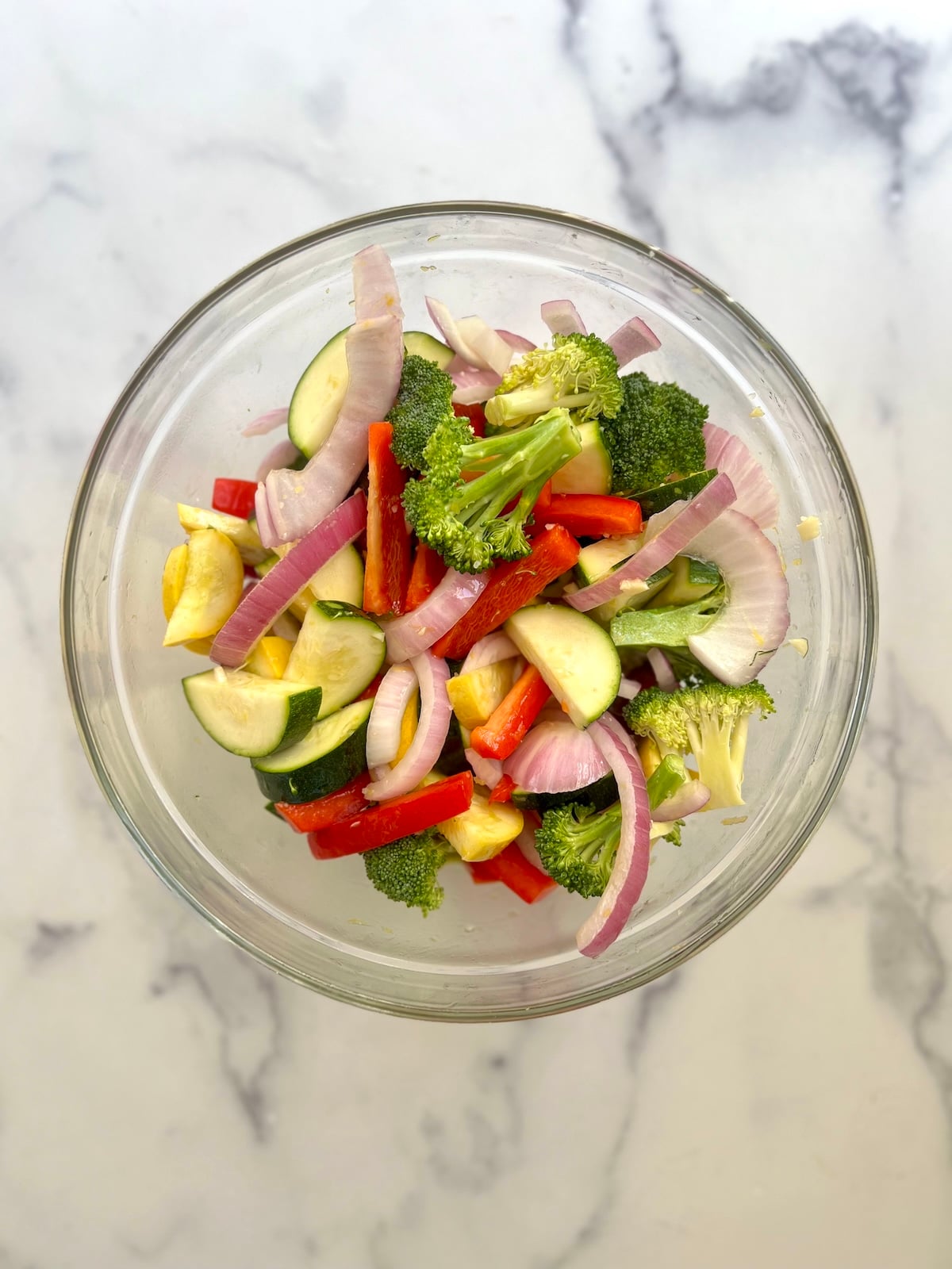 Chopped vegetables in a glass bowl.