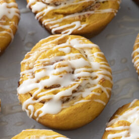Quick pumpkin cinnamon rolls with glaze.