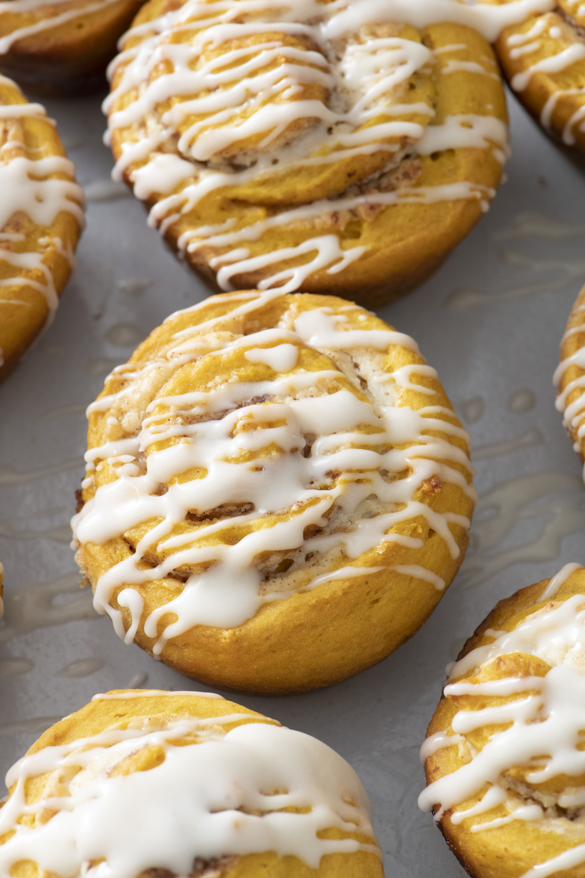 Quick pumpkin cinnamon rolls with glaze.