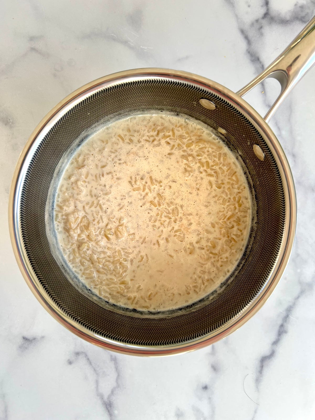 Rice pudding ingredients in a sauce pan.